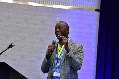 Speaker engaging audience at Tech Valley Cybersecurity Symposium