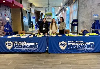 Registration desk at Capital Region Cybersecurity Symposium, presented by LogicalNet